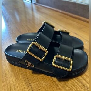 Like new, Prada leather strap slides